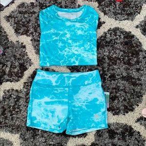 reef legends rash guard and short set